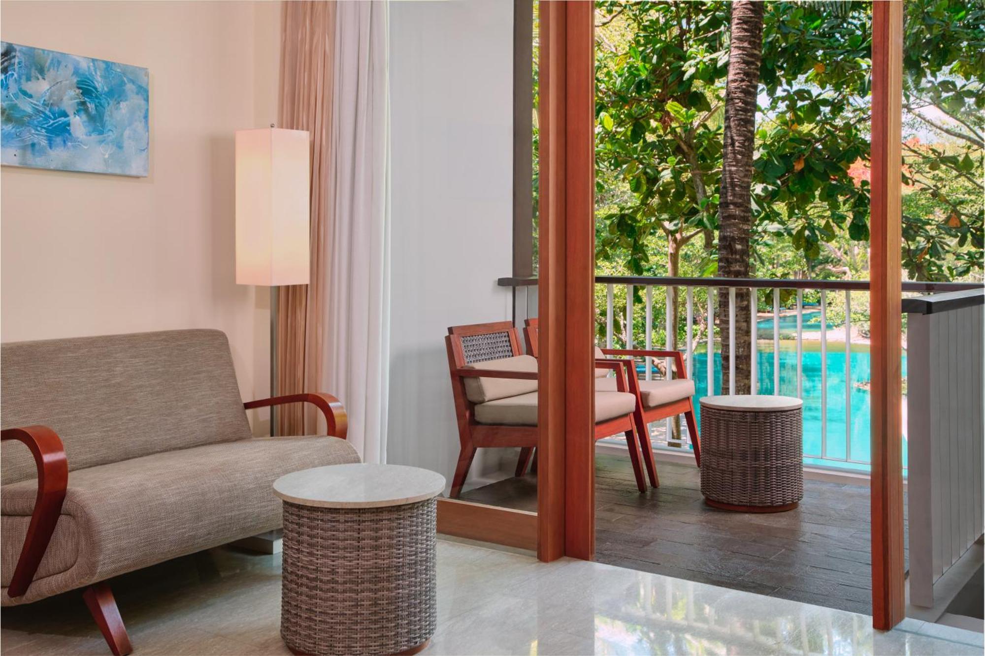 Deluxe King Room Balcony & Pool View