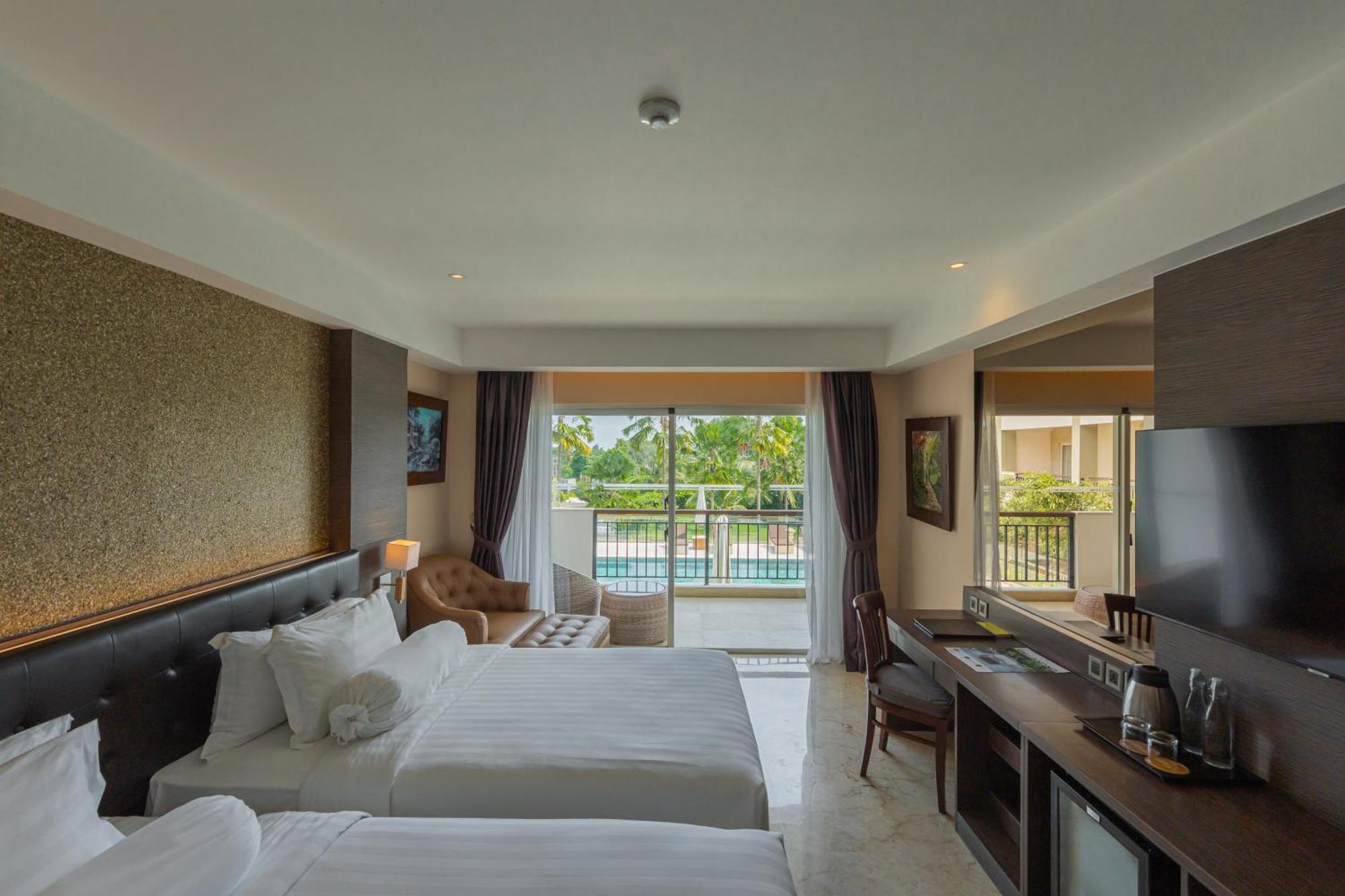 Deluxe Twin Balcony Room Pool View daily shuttle to Ubud City Photo Session Art Gallery Visit 24-hour access to Fitness Center Welcome Drink Kids Activities