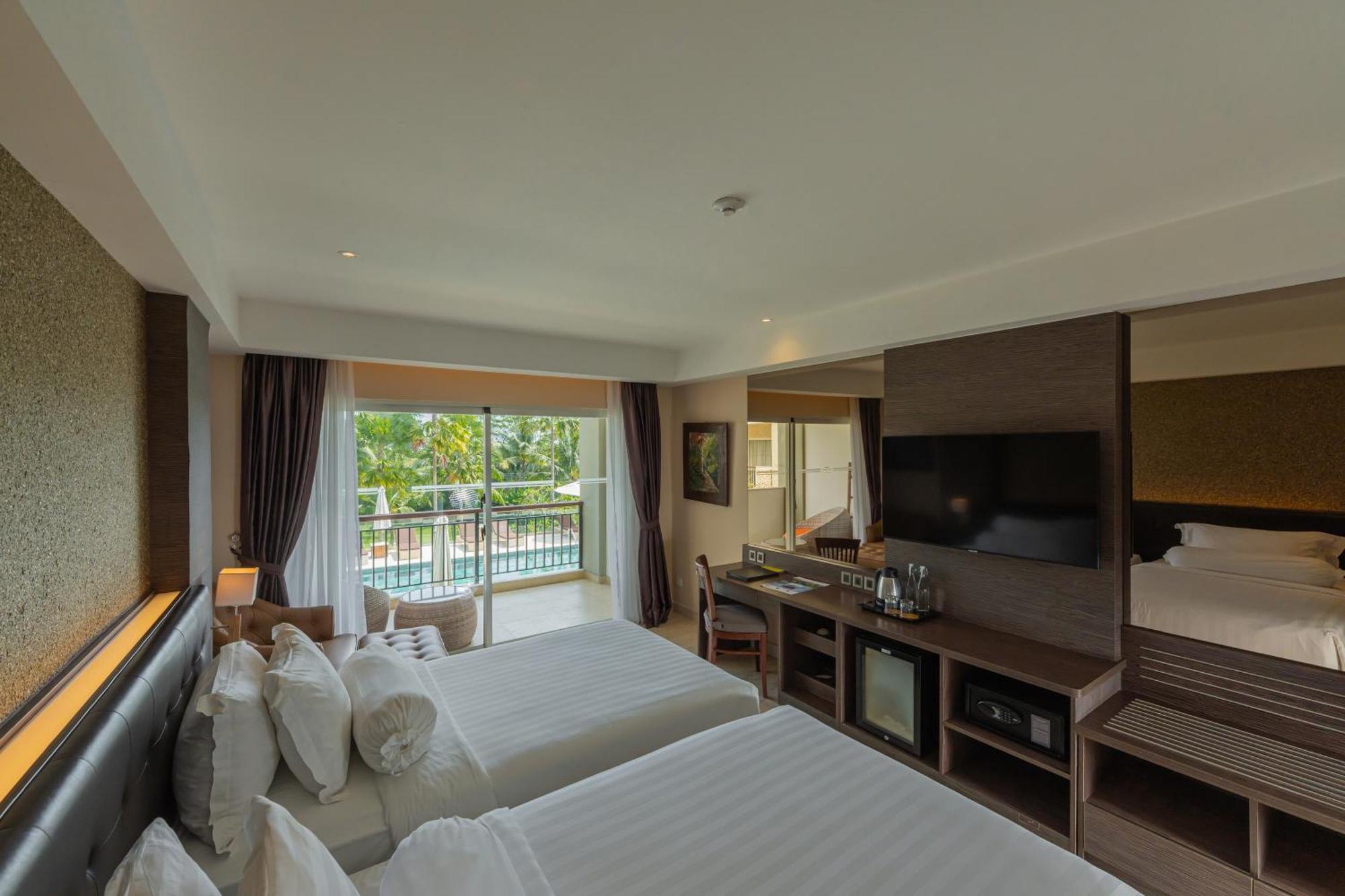 Deluxe Twin Balcony Room Pool View daily shuttle to Ubud City Photo Session Art Gallery Visit 24-hour access to Fitness Center Welcome Drink Kids Activities