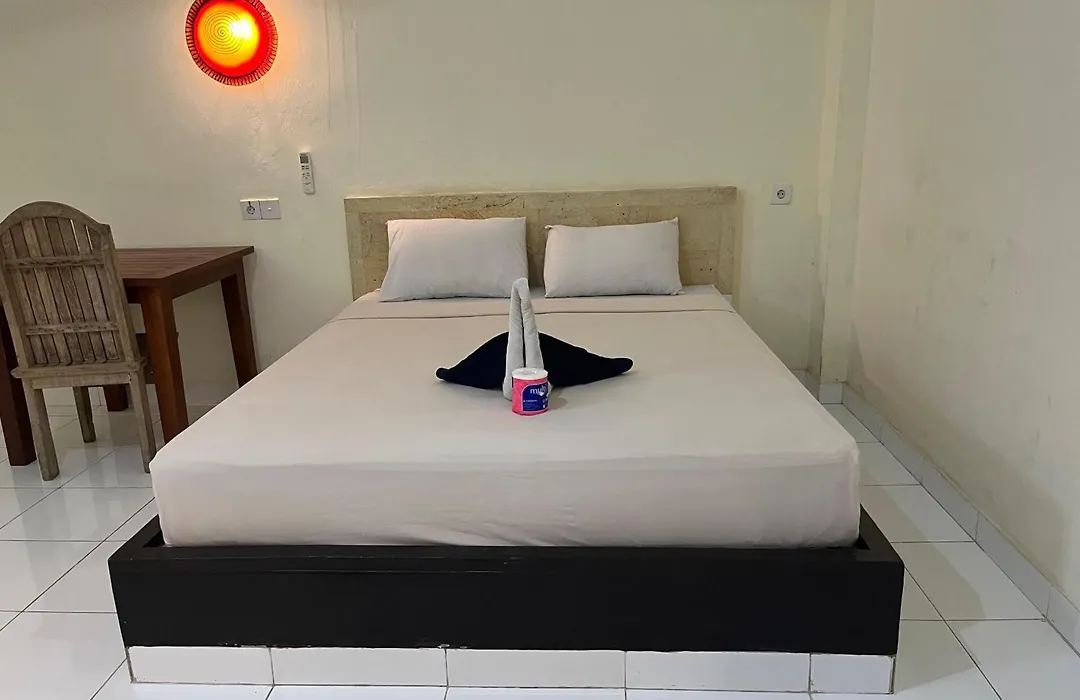 Amed Stop Inn Homestay, Rooftop Restaurant And Bar-1